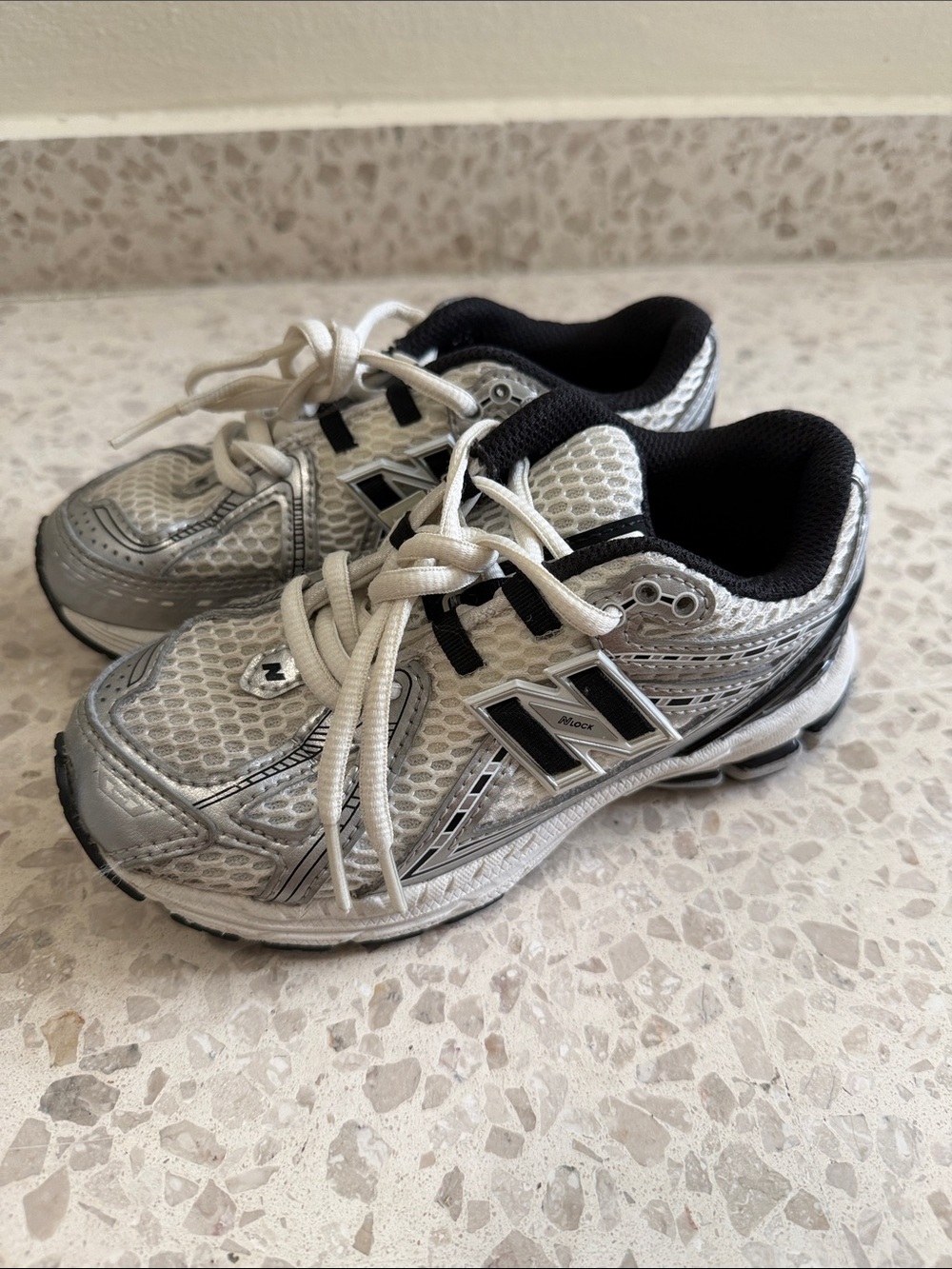New Balance Kids Silver and Black Athletic Sneakers